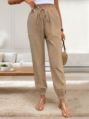 Tan linen-blend joggers with drawstring waist and gathered cuffs