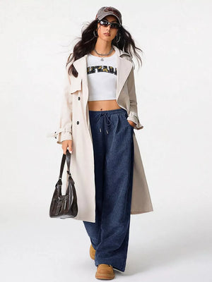 Blue corduroy wide-leg maternity trousers with drawstring waist.