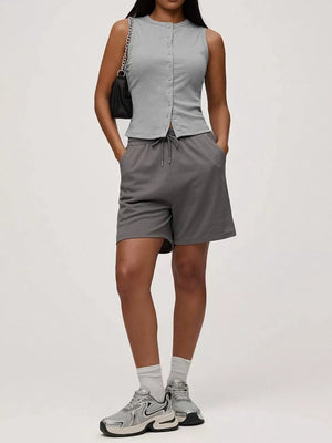 Sleek ribbed button-front tank top in light gray polyester with a round neckline.
