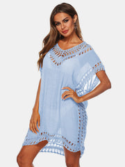 Light blue kaftan cover-up with crochet trim and fringe detail.
