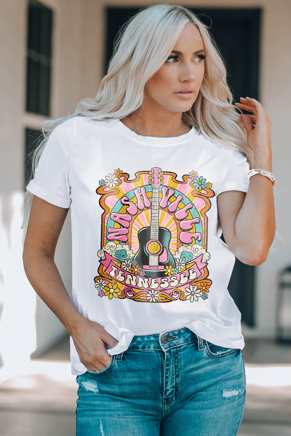 White graphic t-shirt with Nashville guitar and floral design