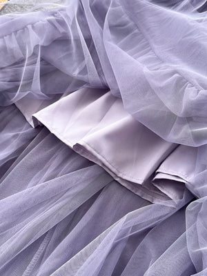 Purple tiered tulle skirt with lining, showing texture and layers