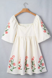 Cream floral puff sleeve square neck A-line dress with embroidered flowers.