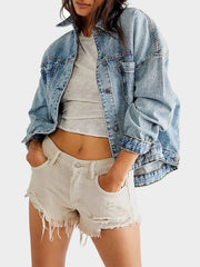 Oversized light wash denim trucker jacket with back pleat detail and button closure