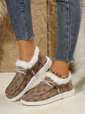 Southwestern print faux fur lined loafers in taupe with white laces and white soles.