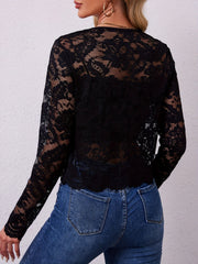 Black lace cropped open-front jacket with scalloped hem and long sleeves.
