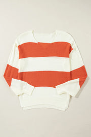 Orange and white striped V-neck knit sweater with a slouchy fit.