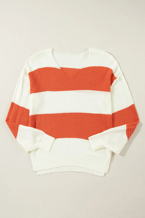 Orange and white striped V-neck knit sweater with a slouchy fit.
