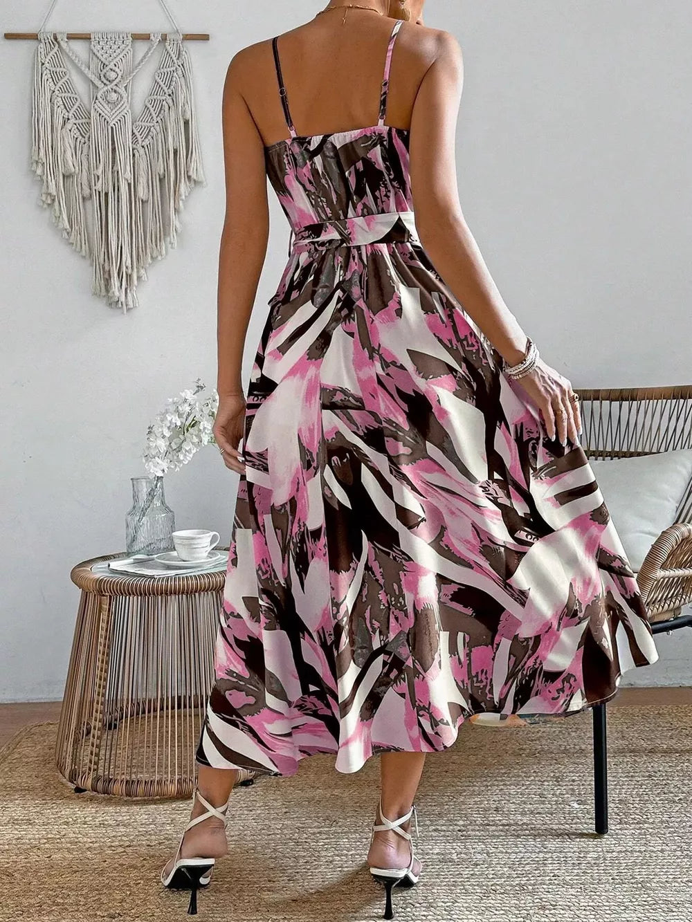 Belted cami midi dress with vibrant abstract print in fuchsia pink, white and brown.
