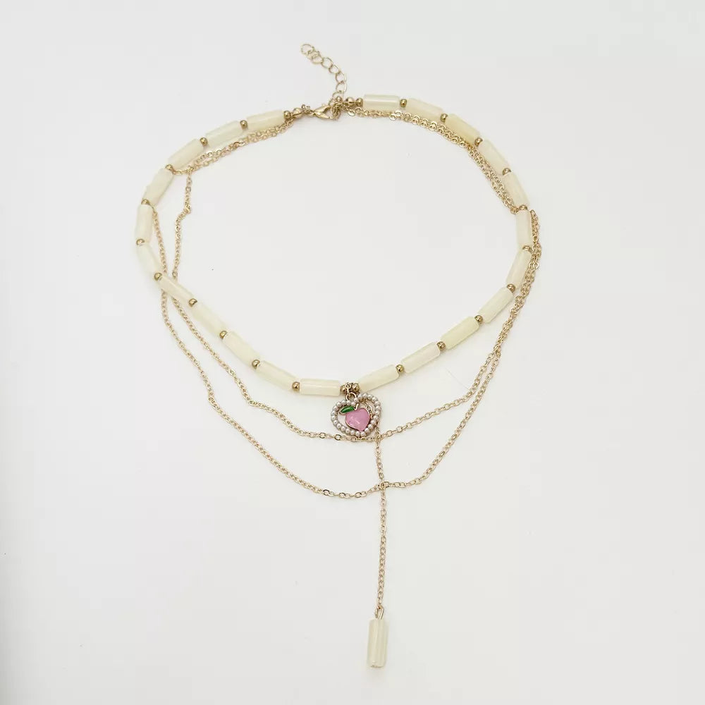 18k Gold-plated Layered Heart Pendant Necklace in Gold, back view