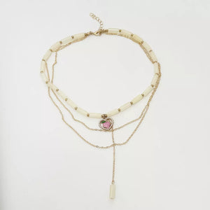 18k Gold-plated Layered Heart Pendant Necklace in Gold, back view