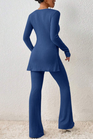 Royal blue ribbed knit co-ord set with long sleeves, side slit tunic and flared pants.