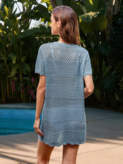 Light blue crochet beach cover-up dress with short sleeves and scalloped hem.