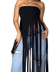 Black bohemian tube top with long fringe trim, styled with ripped jeans.