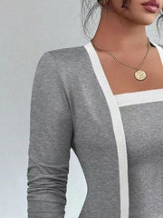 Gray two-piece cardigan set with white trim and long sleeves.