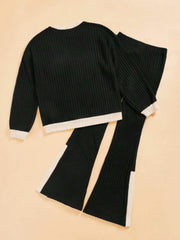 Black ribbed knit loungewear set with contrast trim and slit hem pants