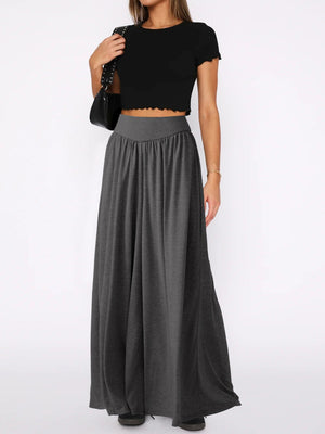 Drape-front wide-leg jersey trousers in dark gray with a high elastic waist.