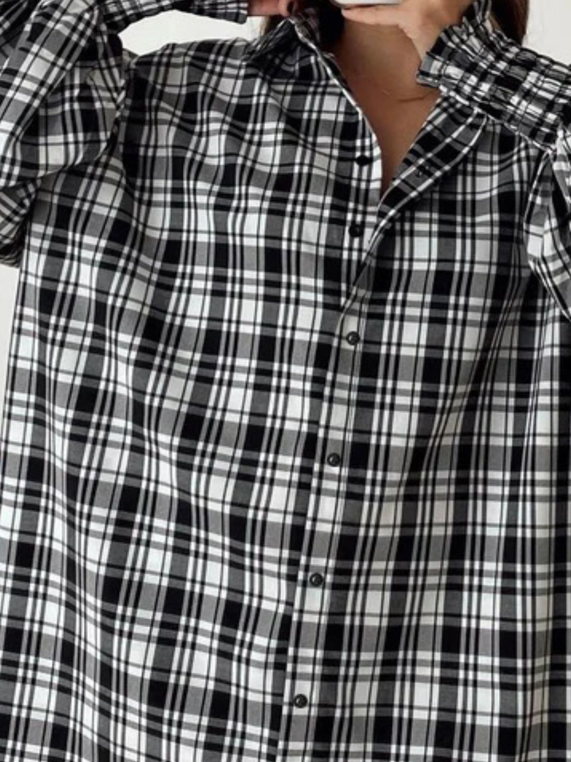 Black and white plaid shirt with ribbed cuffs and button front