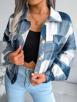 Oversized blue tartan shacket with patch pockets and button front.