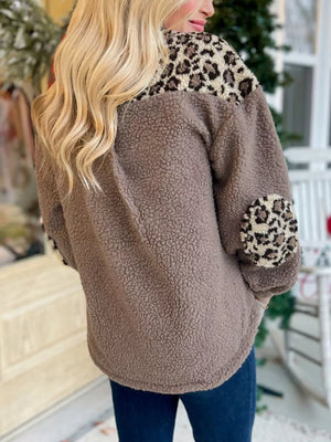 Plush leopard print fleece jacket with button-down detail and animal print elbow patches.