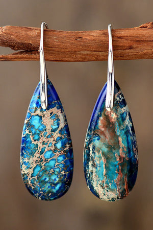 Ocean Jasper dangle earrings in blue/silver with teardrop shape and natural stone pattern.