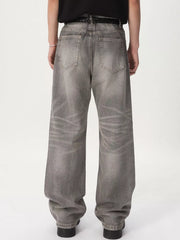 Men's vintage wash wide leg jeans in gray cotton with a relaxed fit.