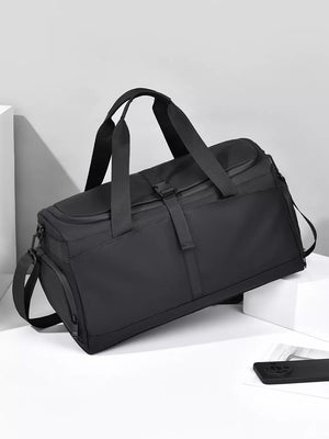 Black Oxford cloth travel bag with dual handles and detachable strap, perfect for organizing toiletries.