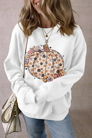 White crewneck sweatshirt with a floral pumpkin graphic and "Pumpkin Season" text.