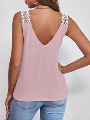 Pink waffle knit tank top with white lace shoulder straps and V-neck