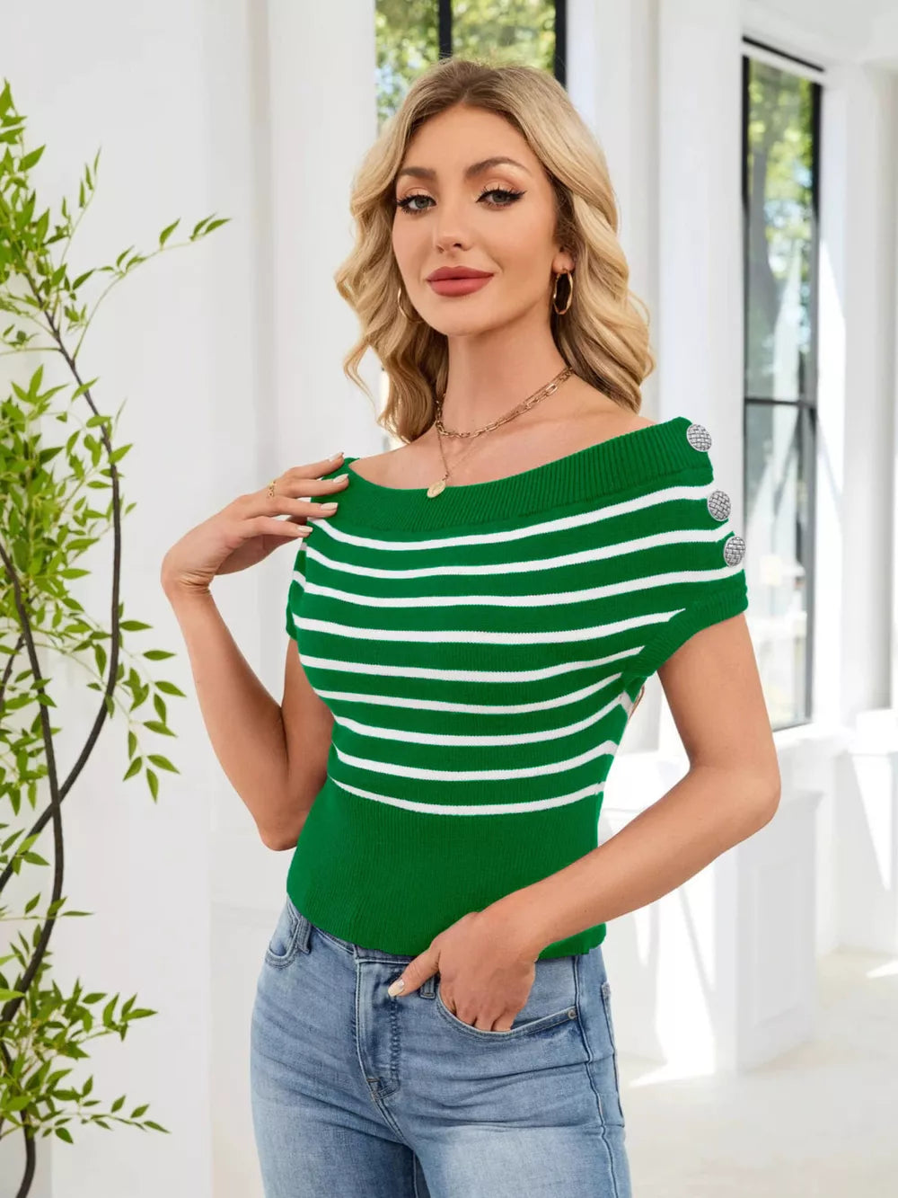 Green striped knit sweater with decorative buttons and off-the-shoulder neckline