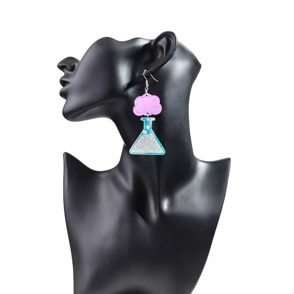 Funky science beaker dangle earrings in fuchsia pink acrylic with glitter detail.