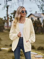 Textured knit dolman sleeve hoodie in Pastel Yellow with zip front and pockets.