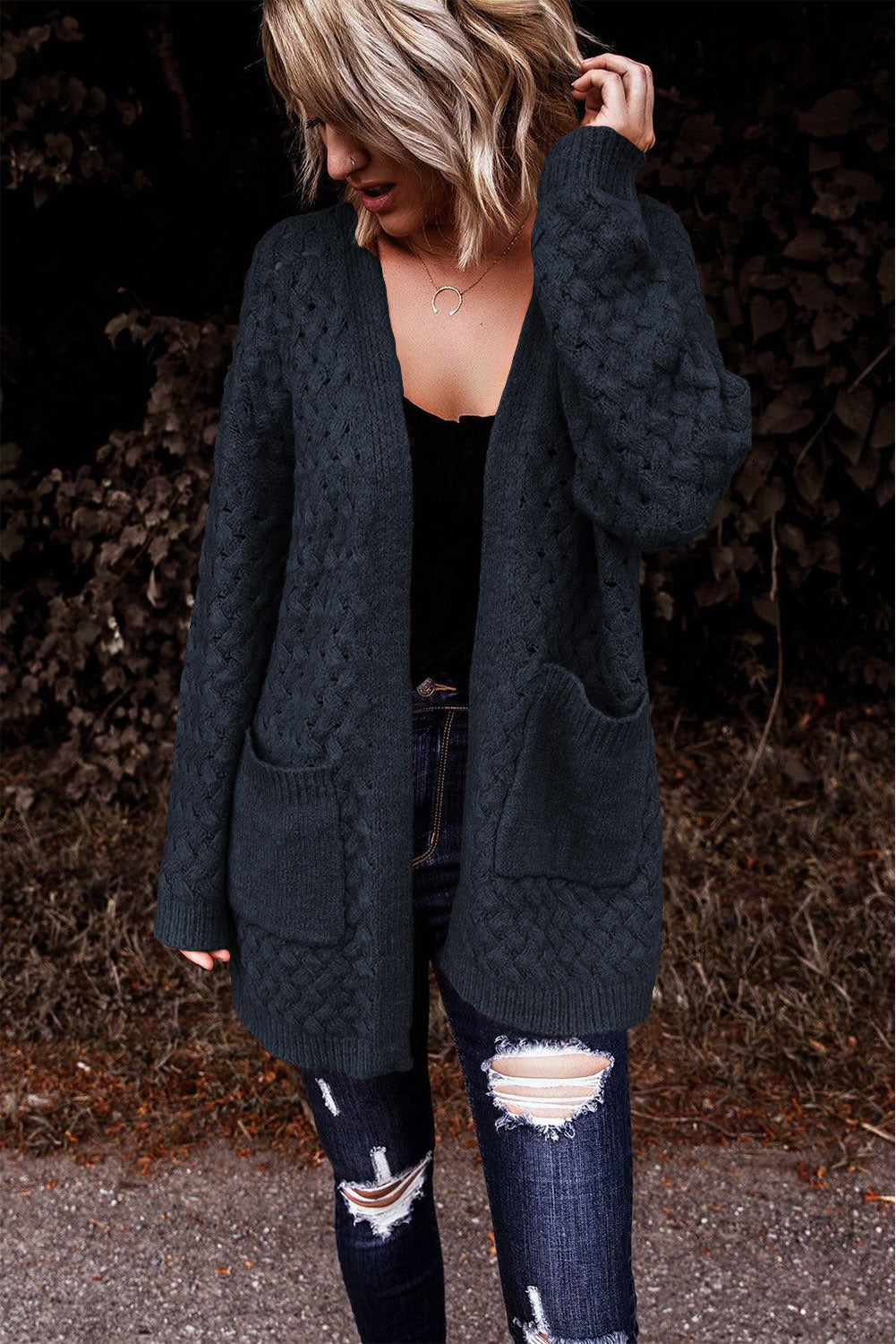 Dark gray open-knit pocket cardigan with textured pattern and long sleeves.