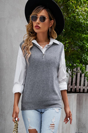 Dark Gray ribbed knit vest with zip-neck and collar, layered over a white shirt.