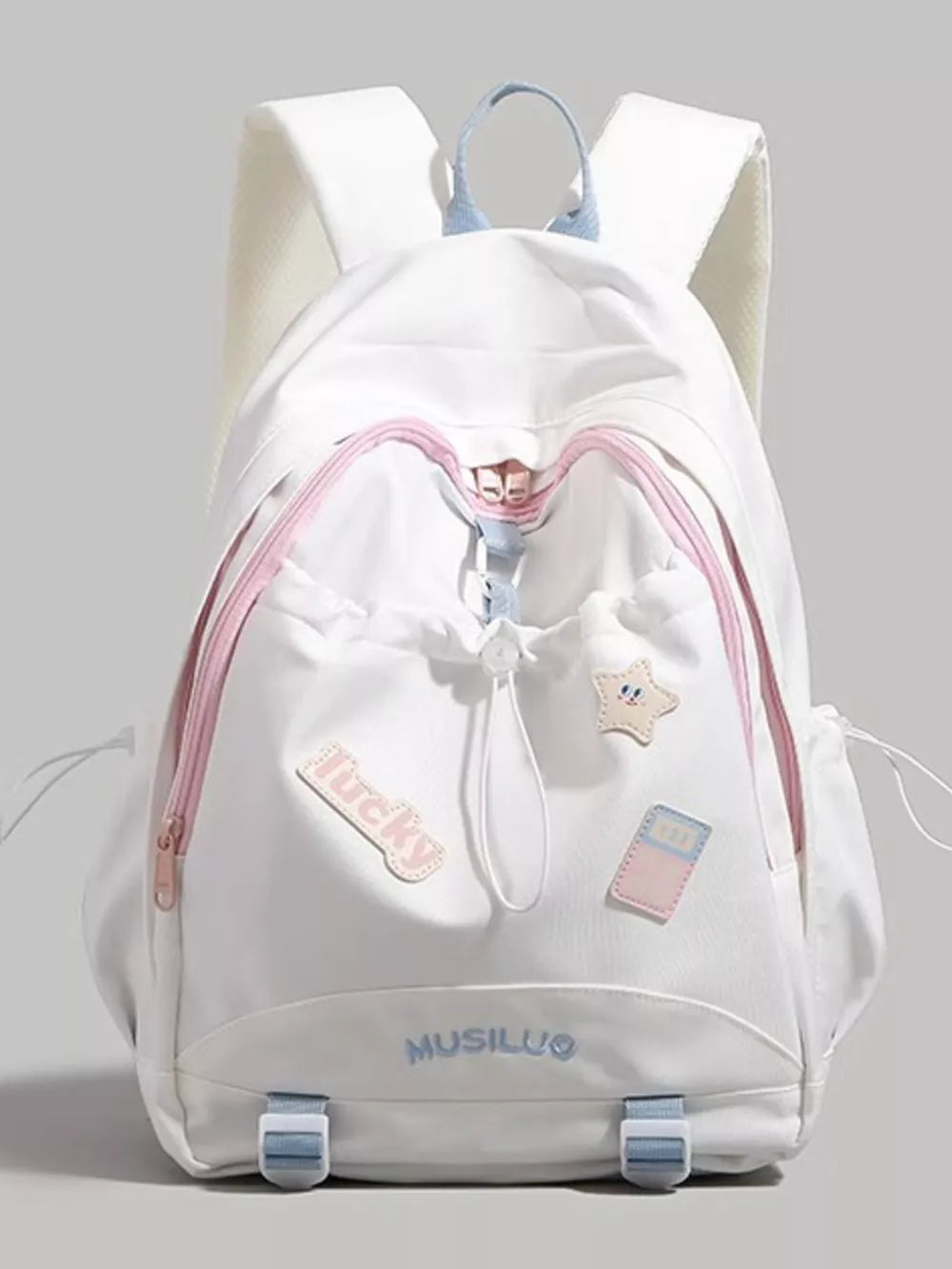 White drawstring backpack with pink trim, cute patches, and blue accents.