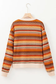 Geometric knit bomber jacket in orange with a zig-zag pattern and ribbed cuffs.