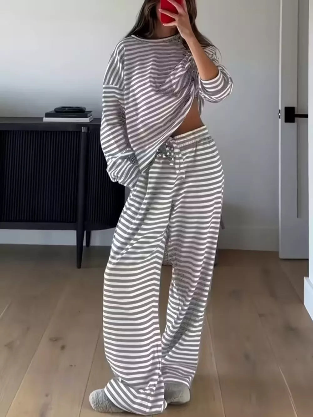 Light gray striped pajama set with drawstring pants and ruched top.