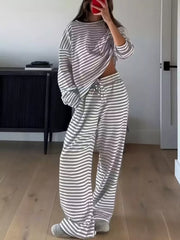 Light gray striped pajama set with drawstring pants and ruched top.