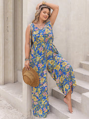 Blue floral tie-shoulder wide-leg jumpsuit with drawstring waist.