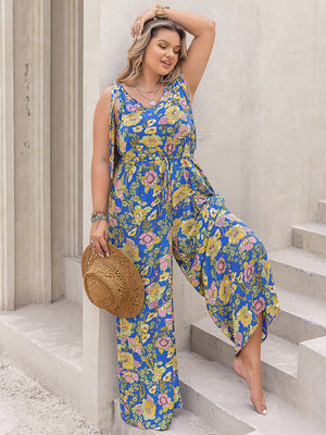 Blue floral tie-shoulder wide-leg jumpsuit with drawstring waist.