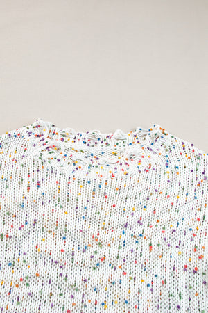 White confetti knit sweater with distressed neckline detail