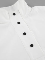 White two-piece set with snap button details and a high neckline.