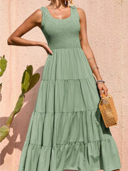 Light Green smocked bodice ruffled maxi dress with tiered skirt and scoop neck.
