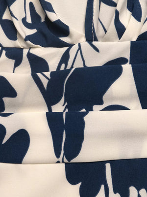 Botanical print maxi dress with cap sleeves and square neck.