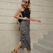 Mid gray cargo denim midi skirt with adjustable ruching and side slit.