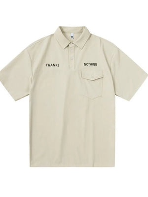 Apricot polo shirt with button detail, chest pocket, and "THANKS NOTHING" text.