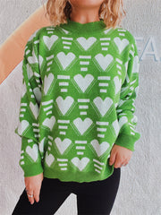 Neon green acrylic knit jumper with white geometric heart pattern, crew neck, long sleeves.