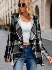 Asymmetric plaid drape front jacket in black, white, and gray, with open front and waterfall lapels.
