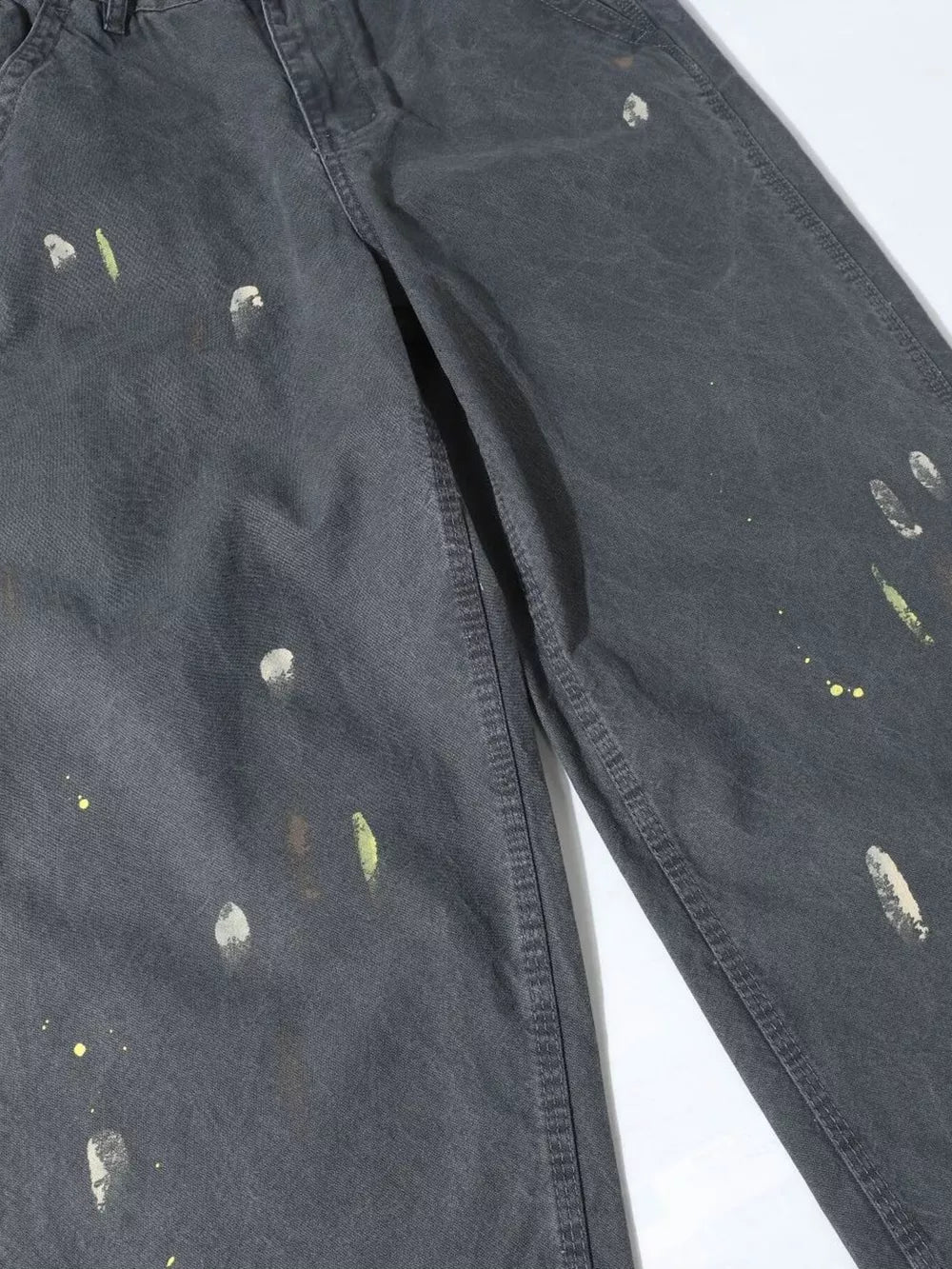 Grey sweatpants with loose fit and ink splash details