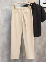Men's Khaki straight-leg cargo pants with elastic waistband and back pockets.